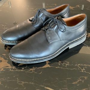 Heschung leather derby shoe with pebble accents around the laces and ankle.